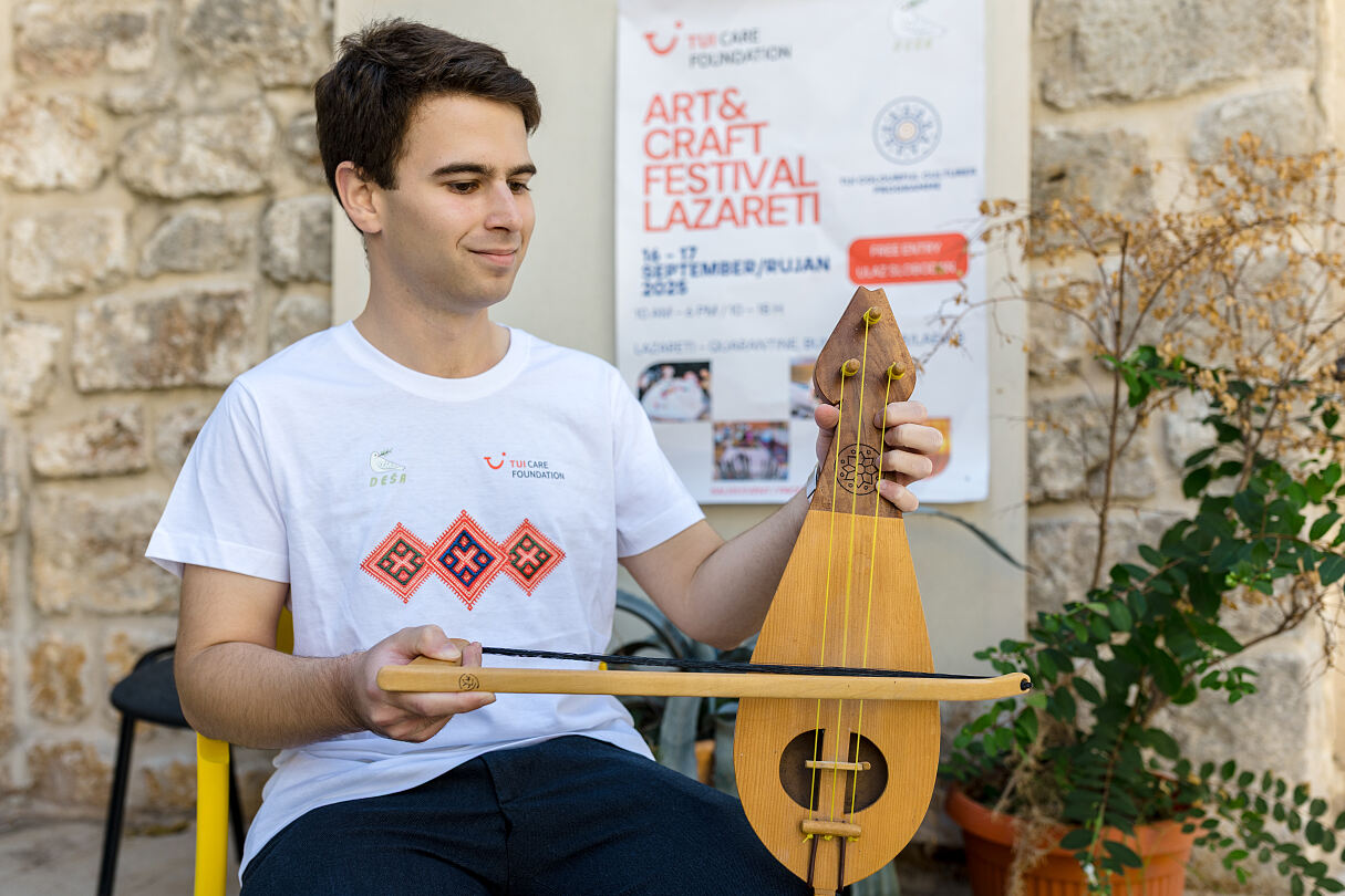 TUI Colourful Cultures Croatia - hand crafted instrument at Arts & Crafts Fair